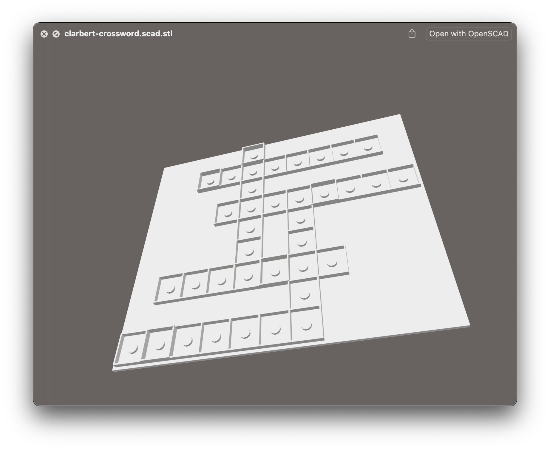 A full crossword printed in the same way. There’s a large, flat, 11x9 base plate, and then on top of it a crossword grid is elevated. In each cell of the crossword is another stubby little circle. Some cells have higher walls than others - they are highlighted cells.